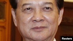 A woman runs for cover as heavy gunfire erupts in the Miskin district of Bangui, Central African Republic. In what a French soldier on the scene described as the heaviest exchange of fire he'd seen since early December 2013, Muslim militias engaged Burundi troops who returned fire.