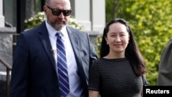 孟晚舟引发加拿大和中国之间的外交紧张。图为被加拿大逮捕的华为财务总监孟晚舟离开其加拿大住所。(2019年5月8日资料照)
