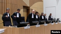 Судді на першому засіданні процесу у справі збитого авіалайнера рейсу МН17. 9/03/2020