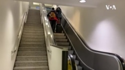 旅客在美国乘飞机时采取措施预防新冠病毒