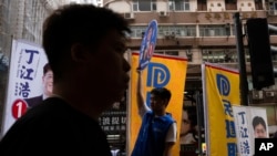 香港2023年12月10日举行了新规则下“仅限爱国者”参与的区议会选举。(美联社)