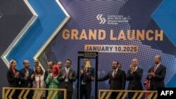 ኣብ ስነ-ስርዓት ምክፋት ስቶክ ኤክስቸንጅ