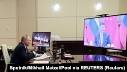 俄罗斯总统普京在莫斯科与中国领导人习近平举行在线俄中首脑会议。(2021年12月15日)
