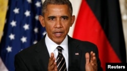 美国总统奥巴马在白宫与德国总理默克尔联合举行的记者会上讲话。(2015年2月9日)