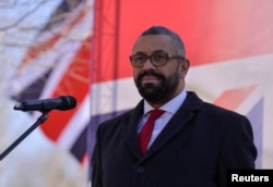 英国外相祁湛明