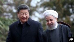 伊朗总统鲁哈尼欢迎到访的中国国家主席习近平(2016年1月23日)