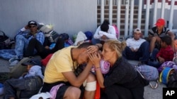 Người di cư từ Trung Mỹ tuần hành đòi quyền của di dân, dừng chân tại nơi tạm trú ở Tlaquepaque, bang Jalisco, Mexico, ngày 18/4/2018. (AP Photo/Refugio Ruiz)