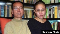 中国人权活动人士、诺贝尔和平奖得主刘晓波(左)及其妻子刘霞(右)。(资料照)