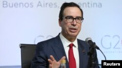 美国财政部长姆努钦在阿根廷布宜诺斯艾利斯召开的20国集团财长与央行行长峰会上召开新闻发布会。(2018年3月20日)