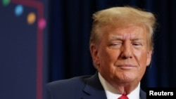 资料照片:美国前总统唐纳德·特朗普2023年12月19日在爱荷华州参加竞选活动。