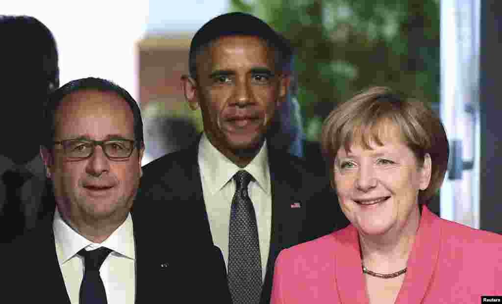 法国总统弗朗索瓦·奥朗德(左),美国总统奥巴马(中)和德国总理默克尔在G7峰会上。