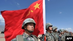 资料照:中国军队参加上海合作组织在吉尔吉斯斯坦举行的反恐联合军演。(2016年9月19日)