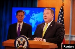 美国国务卿蓬佩奥和国务院负责宗教自由事务的无任所大使山姆·布朗拜克2018年5月29日共同发表《世界宗教自由年度报告》