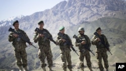 North Korean party officials visit Mankyongdae, the birthplace of North Korean founder Kim Il-sung, on the 101st anniversary of his birth, April 15, 2013.