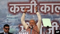 Indian Prime Minister Narendra Modi addresses a rally of his Hindu nationalist Bharatiya Janata Party in New Delhi, Dec. 22, 2019. 