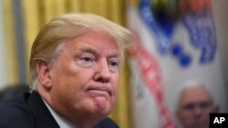 2019年1月31日,特朗普总统在白宫椭圆形办公室会见中国副总理刘鹤。(AP)