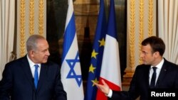 法国总统马克龙和到访的以色列总理内塔尼亚胡在记者会上(2017年12月10日)