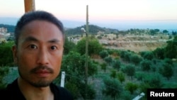 Nhà báo Nhật Jumpei Yasuda trước khi lên đường đi Syria, ngày 23/6/2015.