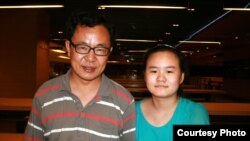 张林(左)和女儿张安妮(右)(照片来源:胡佳拍摄)