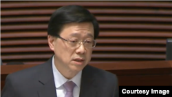 李家超8日在接受立法会质询(立法会视频截图)