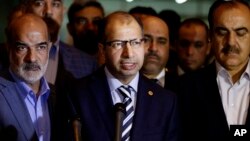 Chủ tịch Quốc hội Iraq Salim al-Jabouri (giữa) phát biểu tại một cuộc họp báo ở thủ đô Baghdad, ngày 13/4/2016.