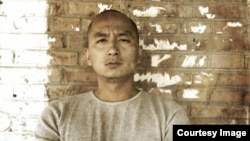 中国诗人王藏(资料图片)