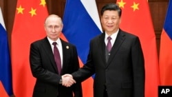 中国国家主席习近平2019年4月26日在北京会晤俄罗斯总统普京。