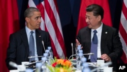 美国总统奥巴马和中国主席习近平在联合国气候大会上(2015年11月30日)