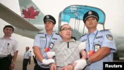 流亡加拿大的中国商人赖昌星2011年被押送回中国