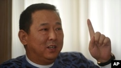 前汉龙集团董事长、四川富豪刘汉(2011年1月16日资料照)