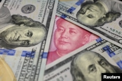 一百美元和一百人民币钞票