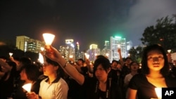 资料照片:2012年6月4日香港民众举行纪念六四事件23周年。