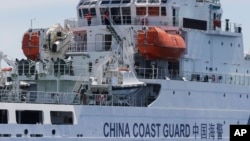 资料照:在南中国海与菲律宾有争议海域的一艘中国海警船