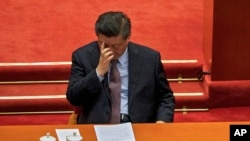 中国领导人习近平在北京人民大会堂举行的全国政协十三届五次会议开幕式上。(2022年3月4日)