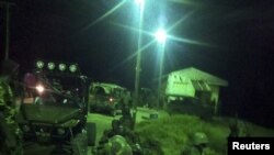 Một cuộc hành quân của các lực lượng Kenya tại địa điểm không được tiết lộ ở Somalia (hình do Bộ Quốc phòng Kenya cung cấp, và không ghi ngày)