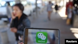图为中国普遍使用的微信应用的手机标志(2016年7月21日)