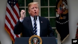 特朗普总统在白宫玫瑰园发表讲话。(2019年5月22日)