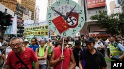 2018年10月1日中国国庆日,香港数千人举行抗议游行,他们担心这个半自治城市的自由受到严重威胁。