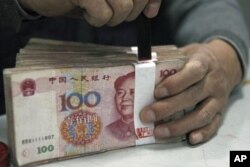 报告指出,人民币汇率仍大大低于按中国中期基本面应有的汇率