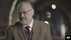 卡舒吉2018年3月出席一个活动(美联社)