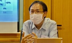 香港伍伦贡学院社会科学院助理教授李敏刚 (美国之音/汤惠芸)