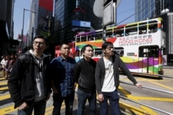 香港反修例运动纪录片《时代革命》导演周冠威(左一)和他的拍摄制作团队 (2016年3月3日)