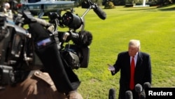 特朗普总统2018年10月22日在白宫见记者(路透社)