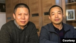 资料照片:许志永(左)和丁家喜