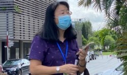 中西区区议会主席郑丽琼质疑中山纪念公园体育馆改建临时”火眼实验室”埋下地区”计时炸弹”,引起当区居民恐慌。 (美国之音汤惠芸拍摄)