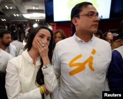 A supporter of cries after the nation voted "no" in a referendum on a peace deal between the government and Revolutionary Armed Forces of Colombia (FARC) rebels, at Bolivar Square in Bogota, Colombia, Oct. 2, 2016.