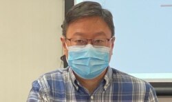 香港浸会大学政治及国际关系学系副教授陈家洛表示,民调结果反映大部份港人对新的选举制度感到抗拒 (美国之音/汤惠芸)