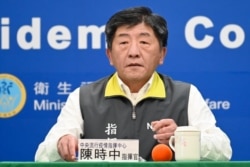 资料照:台湾中央流行疫情指挥中心指挥官陈时中在记者会上 (2020年3月11日)