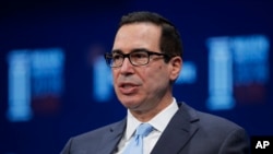 姆努钦2018年4月30日出席一场活动(美联社)