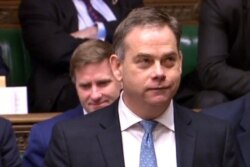 资料照:英国外交国务大臣纳杰尔·亚当斯